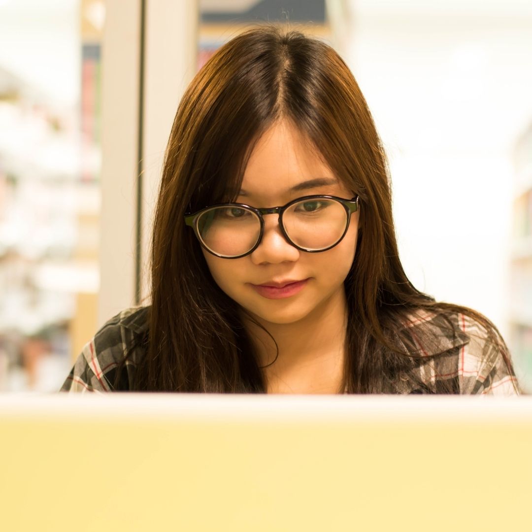 girl looking at the computer