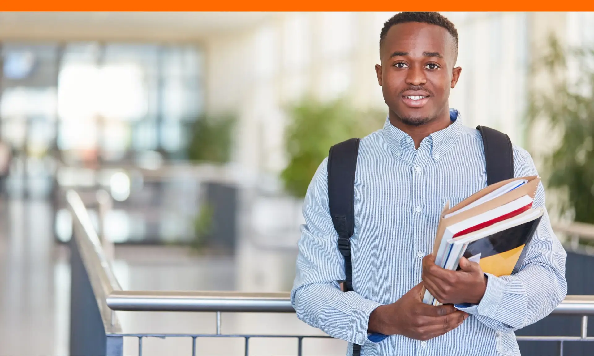 Teen boy gathering documents for Ohio scholarships